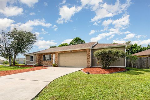 Photo of 706 Isle Royale Avenue NW, Palm Bay, FL 32907 (MLS # O6343794)