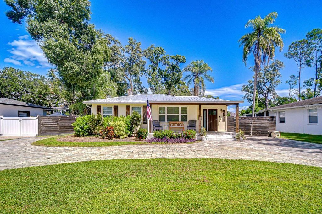 Photo of 1013 W Berry Avenue, Tampa, FL 33603 (MLS # TB8434125)