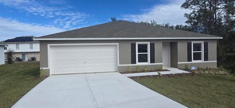 Photo of 409 Oakland Lane, Poinciana, FL 34759 (MLS # C7518447)