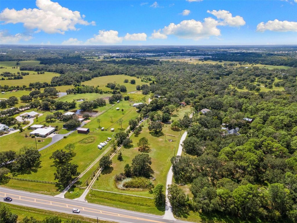 Photo of 15571 County Road 675, Parrish, FL 34219 (MLS # A4666820)