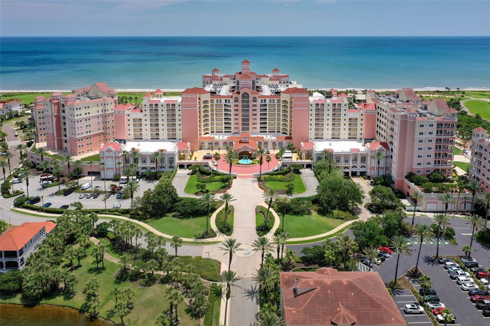 Welcome to this Spectacular Oceanfront Condo at The Hammock Beach Golf Resort and Spa. It doesn't get much better than this! Experience luxury coastal living with breathtaking ocean views from the 9th floor in this stunning 4-bedroom, 4 1/2 bath condo nestled within the incredible Hammock Beach Club. Spanning 3,264 square feet, this expansive residence offers panoramic views of the Atlantic Ocean and the Jack Nicklaus Signature Ocean Golf Course. Step inside to discover high-end finishes throughout, including granite countertops and premium appliances. The spacious, open layout is perfect for entertaining, with a wraparound balcony that invites you to relax and enjoy the sweeping coastal scenery. Many updates elevate the home’s appeal even further, featuring elegant crystal chandeliers, a custom stone fireplace with a disappearing TV, and convenient automatic hurricane shutters. Resort-style amenities abound with a optional Hammock Beach membership. You can enjoy multiple leisure pools, and adult hot tub, a lazy river, waterslide, world class fitness center and pristine beach access. There are four on site dining venues and a nine hole putting course. In addition two award winning golf courses including the Jack Nicklaus designed course with no less than six holes along the ocean. Pamper yourself at the onsite spa and sauna or indulge in fine dining at the community’s top-tier restaurants. Whether you're seeking a full-time residence, vacation getaway, or investment opportunity, this piece of paradise is a rare find. Call today to schedule your private tour and make Hammock Beach your new coastal retreat.