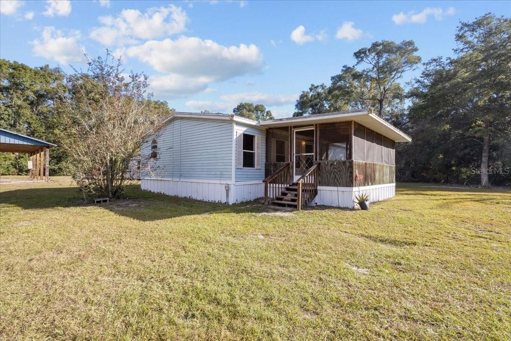 Photo of 9051 NW 125th Lane, Chiefland, FL 32626 (MLS # GC535269)