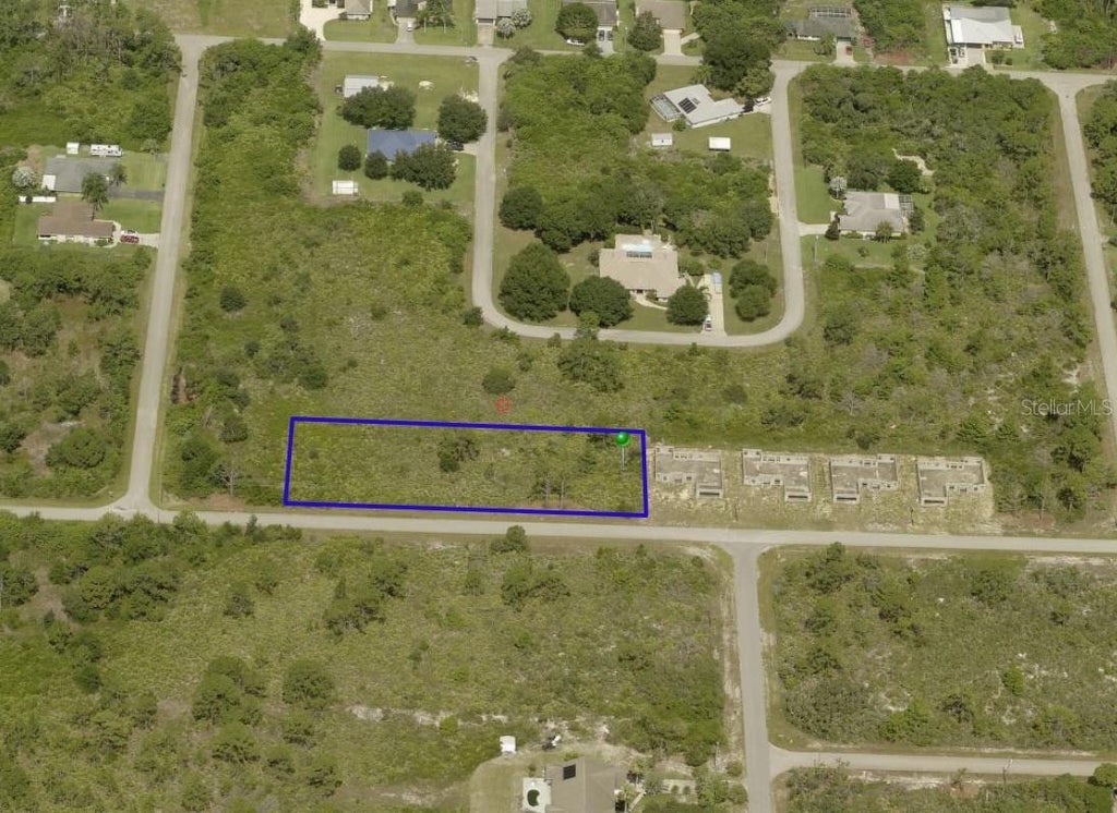 Photo of 647 Corsica Avenue NE, Lake Placid, FL 33852 (MLS # O6451952)