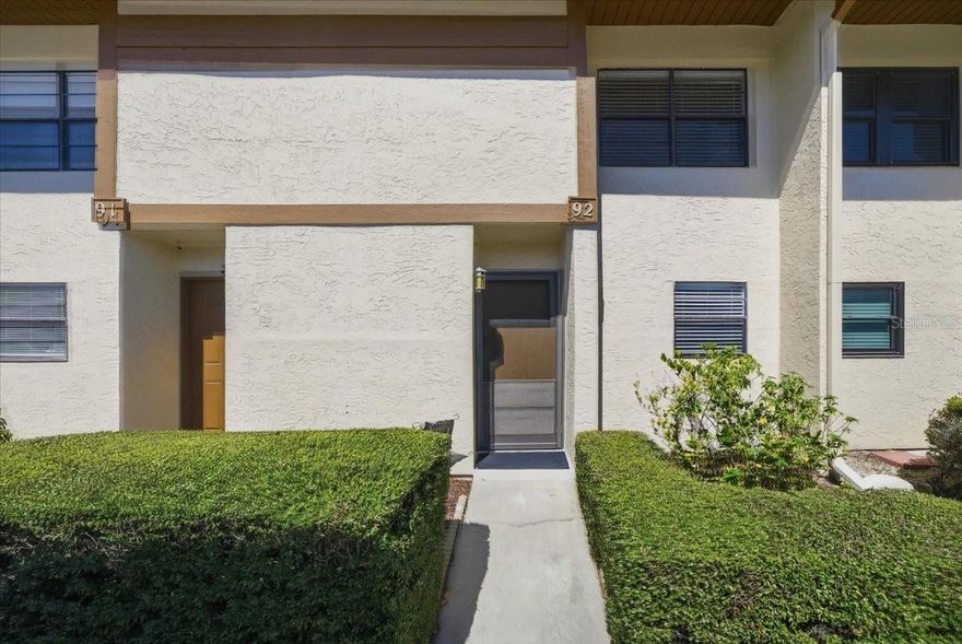 Welcome to the highly desirable Townhomes of Lake Seminole — offering true waterfront living with peace of mind in Seminole. This unit remained high and dry during recent storms, and flood insurance is included in the monthly HOA dues.

Nestled along beautiful Lake Seminole, this active waterfront community features a private park, fishing dock, and water access perfect for launching your kayak, canoe, or paddleboard for a serene morning on the lake. Residents also enjoy a sparkling pool, tennis and pickleball courts, and a clubhouse designed for the Florida lifestyle.

This move-in ready 2-bedroom, 1.5-bath two-story townhome has been thoughtfully updated with renovated bathrooms, granite countertops in the kitchen and baths, and stainless steel appliances. The open-concept living and dining area is light and bright, with sliding doors leading to your private screened lanai — ideal for relaxing and watching wildlife or nearby tennis matches. Upstairs, you’ll find two spacious bedrooms, including a primary suite with custom built-in closet cabinetry.

Additional highlights include a newer HVAC (2022), new washer (2022), assigned covered carport parking, private laundry and storage, plus recent community improvements including a new roof (2022) and exterior painting (2021).

The HOA covers an impressive list of essentials: flood insurance, cable TV, high-speed internet, water, sewer, trash, exterior building maintenance (including roof), lawn care, and pest control — offering true peace of mind and low-maintenance living.

Ideally located just minutes from Seminole City Center, close to shopping and dining, less than five miles from the beautiful Gulf beaches, and convenient to St. Petersburg College.

Whether you’re looking for a full-time residence or a Florida retreat, this well-maintained lakefront community offers the lifestyle you’ve been dreaming of. Welcome home.