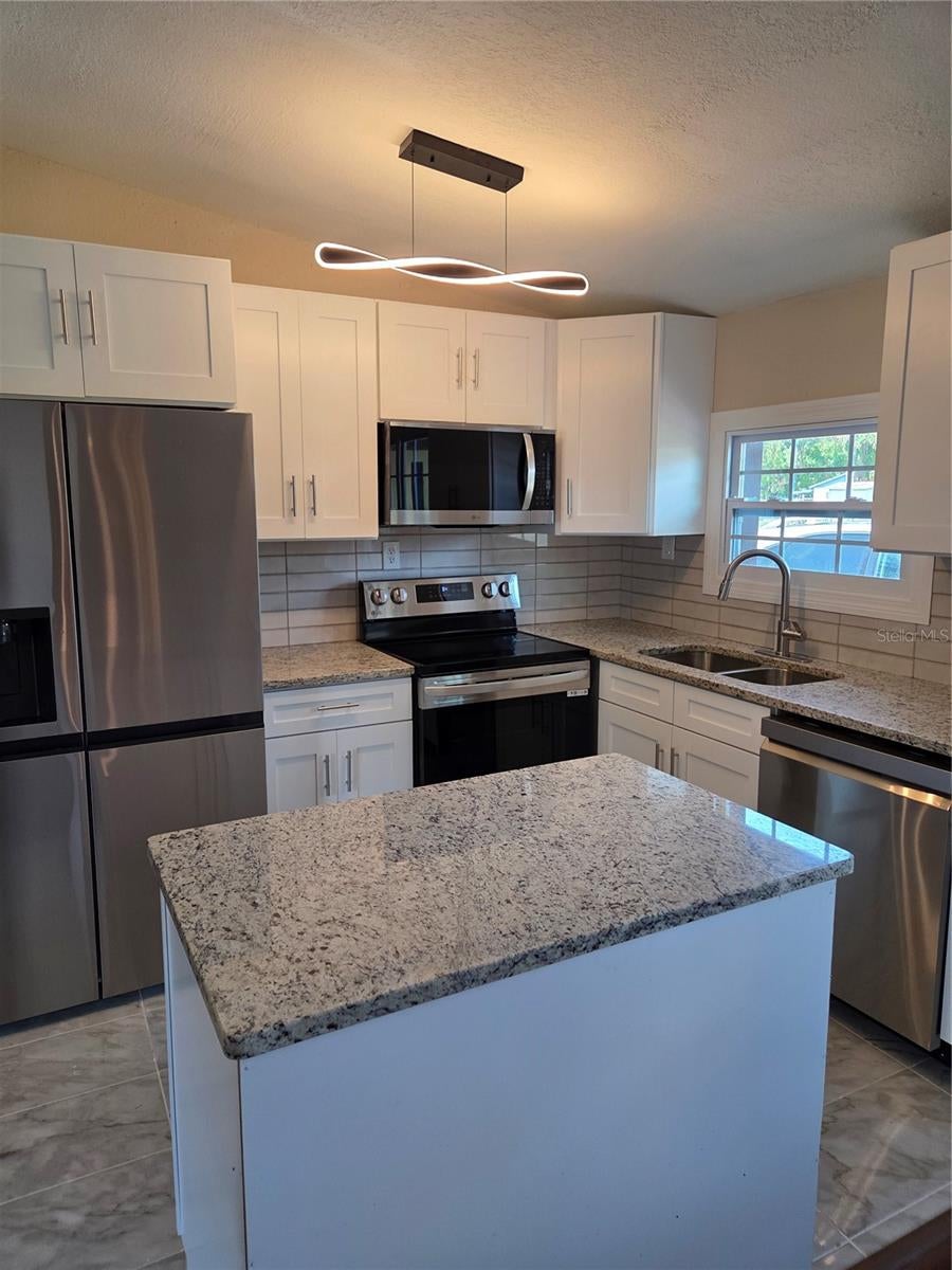 Photo of 3810 E 32nd Avenue, Tampa, FL 33610 (MLS # TB8525051)
