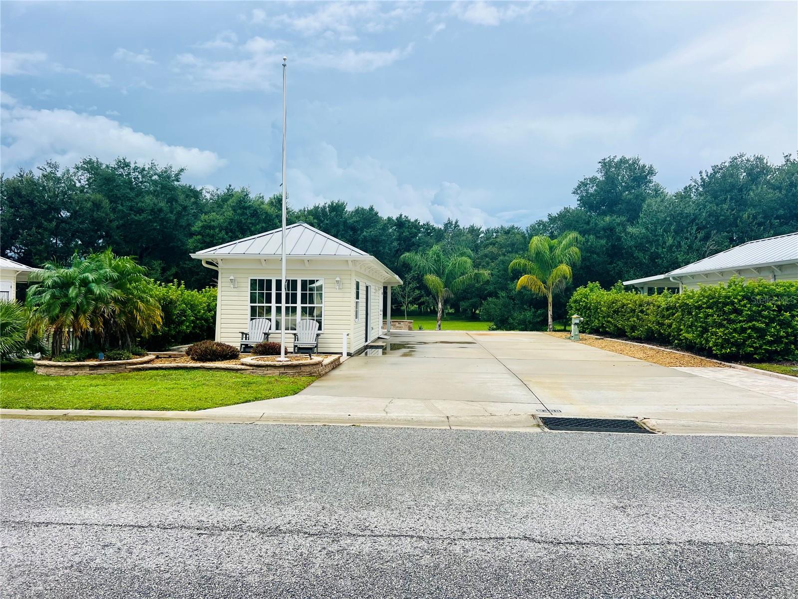 A rare find in Florida’s friendliest motorcoach resort: a preserve-backed, east-facing back-in
property where nothing will be built behind you. This 5,076 sq ft lot features a 26' x 76'
concrete pad for your motorhome with full hook-ups and a park-like backdrop of live oaks—perfect for enjoying beautiful sunsets
filtered through the trees.
The 384 sq ft Grande Suite is fully remodeled inside and out. Exterior upgrades include pavers
wrapping the entire suite, inviting curb appeal up front with a seating area to watch neighbors stroll by, and an unbelievable rear living area
anchored by a new solid-surface pergola with pavers extending 10 feet beyond and a
travertine-topped seating wall—an ideal setting for evening gatherings and sunset watching. Undermount lighting under the seating wall creates the perfect setting for evenings outside with new friends. Inside, the new
kitchenette offers shaker-style soft close cabinets, granite countertops, a large sink, microwave, and a beverage refrigerator. Comfort is elevated with a ceiling-mounted mini split. The full bath impresses with a stand-up shower and glass
doors, and the rear laundry/storage room provides generous space for gear and supplies. Short
walk to the dog park.
Enjoy all the sought-after Florida Grande attributes—welcoming community vibe, full calendar
of activities, pickleball, clubhouse events, and more—all on a deeded lot that is move-in ready. The main gathering space in the 20,000 sq ft clubhouse has just been refreshed this summer and the pool and spa have recently been resurfaced ready for the winter season.
Opportunities like this don’t last. Preserve locations and remodeled suites with all the hardscaping completed are limited—
schedule your tour now to secure Lot 65 ahead of the peak season.