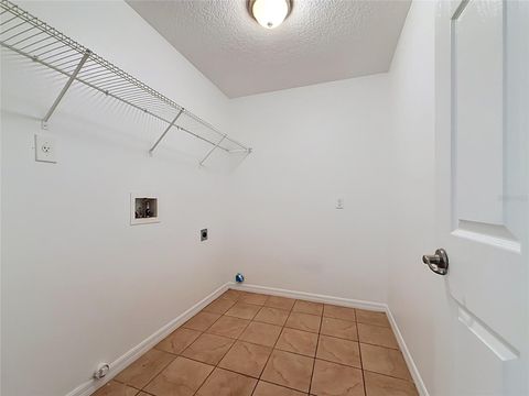 Tiny photo for 127 Stewart Lake Loop, Groveland, FL 34736 (MLS # O6409928)