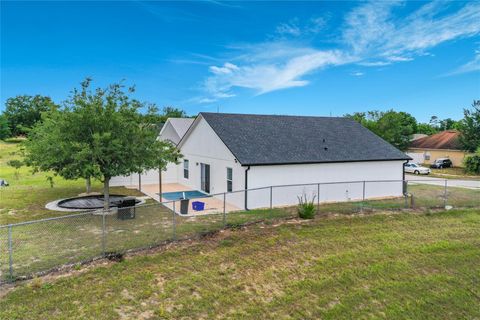 Tiny photo for 127 Stewart Lake Loop, Groveland, FL 34736 (MLS # O6409928)