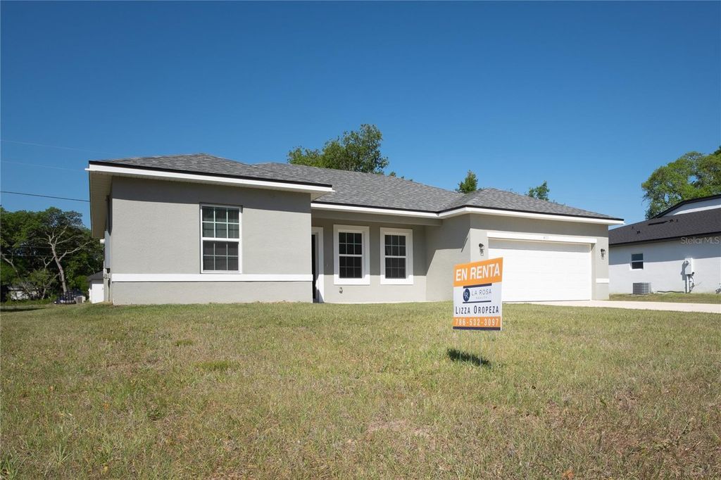 Photo of 422 Marion Oaks Course, Ocala, FL 34473 (MLS # OM723591)