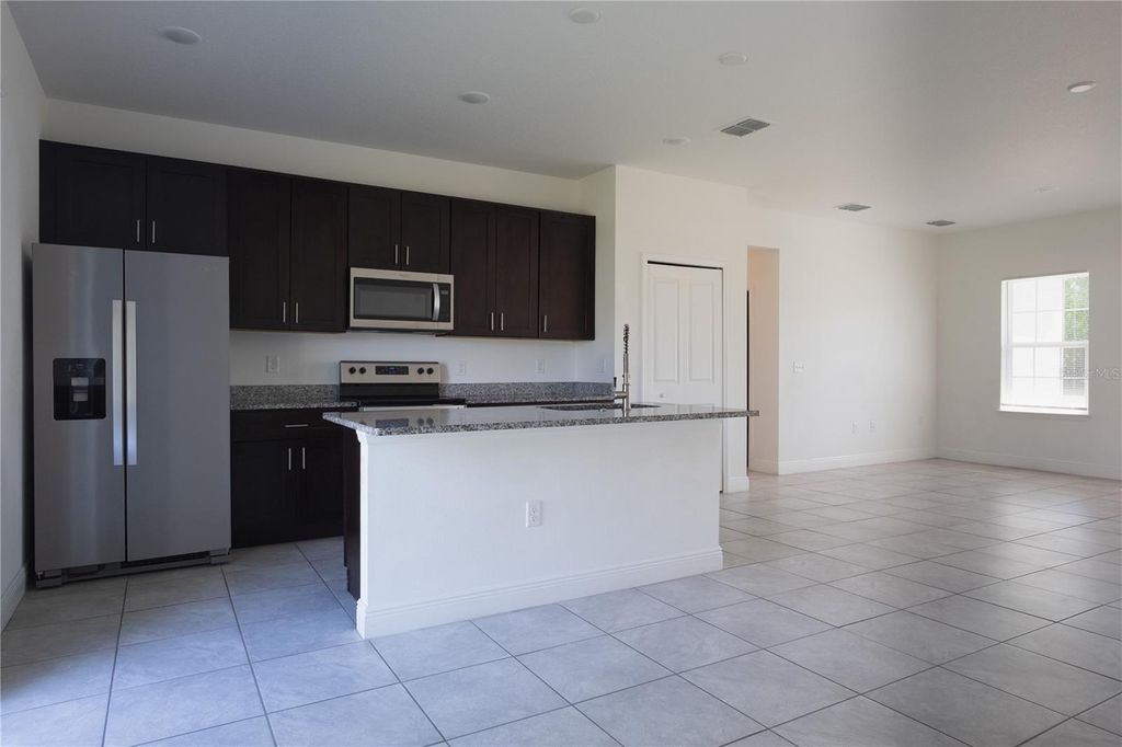 Photo of 422 Marion Oaks Course, Ocala, FL 34473 (MLS # OM723591)