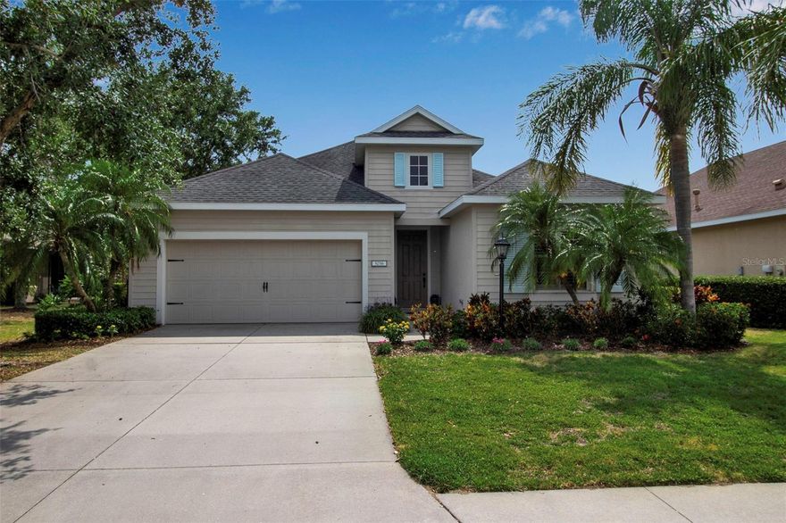 Offered turnkey and fully furnished, this open split floor plan 2-bedroom + den home is light-filled and thoughtfully designed, offering peaceful pond views, flexible living space, and a prime central Lakewood Ranch location on a quiet cul-de-sac. The home features new carpet in all three bedrooms, plantation shutters throughout, hardwood floors in the main living areas, fresh interior paint, and updated floorboards.

The open kitchen includes bar seating, dining, a pantry, newer appliances, and a Bosch stove that is dual-wired for gas. The washer is less than one year old, and the extended, fully screened lanai offers the added convenience of a gas line for grilling, with room to expand and add a pool.

Additional highlights include a newer A/C, and attic eaves wrapped for added insulation, contributing to energy efficiency and year-round comfort.

Maintenance-free living includes lawn care and irrigation covered by the association. Not located in a flood zone, the home is situated in Central Park, where residents enjoy access to a 10-acre community park featuring pickleball and tennis courts, playgrounds, a splash pad, walking trails, dog parks, and sports fields. The property is walking distance to three top-rated schools and just minutes from UTC Mall, Lakewood Ranch Main Street, parks, dining, fitness centers, medical offices, I-75, and Gulf Coast beaches.