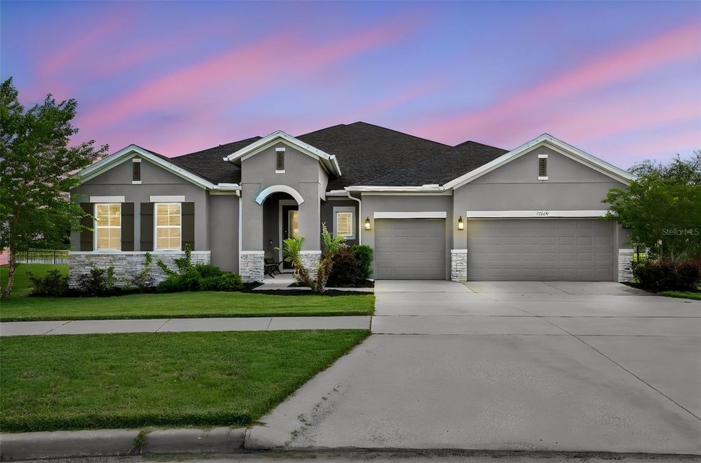 Photo of 17060 Secret Hollow Loop, Clermont, FL 34711 (MLS # O6401874)