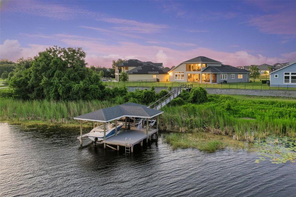 Photo of 17060 Secret Hollow Loop, Clermont, FL 34711 (MLS # O6401874)