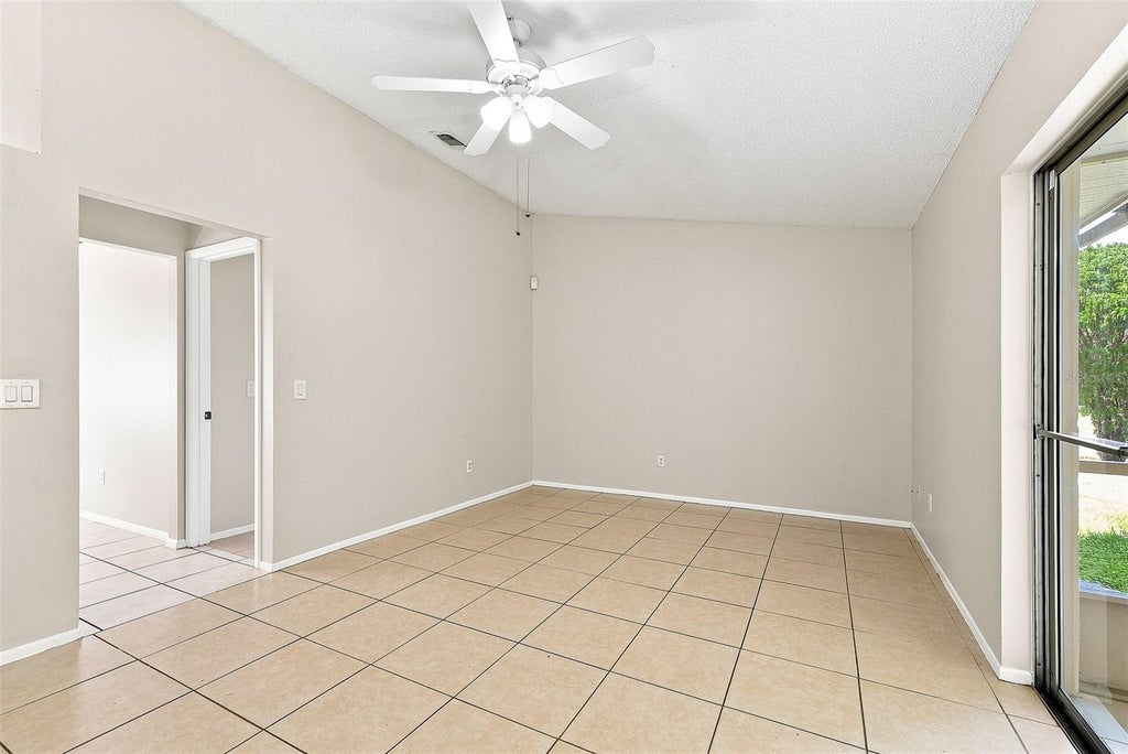 Photo of 7720 Lakeside Woods Drive, Orlando, FL 32810 (MLS # O6441808)