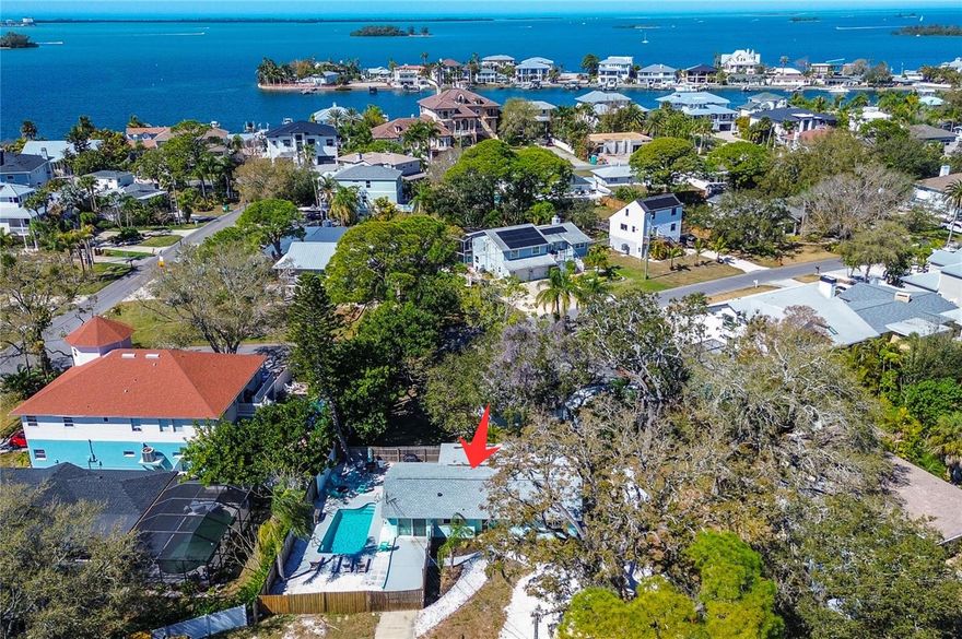 Welcome to Paradise! This stunning REMODELED 3-bedroom, 2-bath home offers the ultimate in FLORIDA COASTAL LIVING. Located in Ozona, a QUAINT OLD FLORIDA, WATERFRONT COMMUNITY. Enjoy the charm of a GOLF-CART FRIENDLY community with easy access to local restaurants, boutique shopping, and the beach just minutes away. Designed to embrace the Florida lifestyle inside and out, from a Breezy, light and bright interior to a tropical oasis backyard with SWIMMING POOL. WIDE LOT 104 ft great for plenty of parking. Plus no HOA or deed restrictions- BRING YOUR BOAT, RV and all your Florida lifestyle toys! There are no rental restrictions in this highly coveted community -think Air BB! Step inside and be greeted by an OPEN-CONCEPT design with expansive great room, perfect for entertaining. The heart of this home is the ALL NEW CUSTOM KITCHEN, featuring new shaker style cabinetry, soft-close cabinets and doors, gorgeous granite countertops and stainless steel appliances. A large CENTER ISLAND and Breakfast Bar with seating for 4 provides ample space for casual dining and gatherings, seamlessly connecting to the living areas for a true sense of spaciousness. Bonus Florida Room off of great room – great FLEX SPACE for an Office. Primary suite and ensuite bathroom with door to the pool area for pool bath. Two REMODELED BATHROOMS. Enjoy true Florida living outdoors with a private Sparkling Pool, perfect for relaxing or hosting guests year-round. Enjoy the Privacy of your Fenced yard. As the evening sets in, you can relax around the fire pit with friends and family. SO MUCH NEW - New Roof & Flashing (2024), New Electrical Panel (2025), New Hot Water Heater (2025), New luxury vinyl plank flooring throughout (2025), Updated Kitchen Cabinets and Island (2025), New Appliances (2025) Updated Bathrooms (2024), A/C (2020) All New Interior Doors & Baseboard (2025), New Pool Pump (2025), New Pool Heater (2025) Fresh Interior Paint (2025) Back Room Enclosed with Engineered Plans & Permits And Includes Impact windows, Stucco Exterior and Metal Door (2025). Located in the charming, Coastal town of Ozona, a laid back golf cart community with no HOA or deed restrictions, you are just steps from local restaurants like Ozona Blue and Molly Goodheads, marinas, parks and the Pinellas Trail. Downtown Palm Harbor is minutes away by golf cart/bike or foot and offers many festivals, craft breweries and fun eateries! Within minutes are Main Street Dunedin and the Tarpon Springs Sponge Docks, as well as Innisbrook Golf Resort home of the PGA Valspar Tournament. Within 5 minutes to world class beaches such as Honeymoon and Caladesi Islands and 20 minutes to Clearwater Beach. This home really offers the True Florida Lifestyle! It is time to Treat Yourself and Start Living the Salt Life You have Always Dreamed of! Zoned for 3 of Pinellas County's most sought after A-rated schools including nationally recognized PALM HARBOR UNIVERSITY HIGH. Move-in ready and turn-key. Don’t miss your chance to own this move-in ready retreat in one of the Gulf Coast’s most unique and inviting neighborhoods. Whether you are looking for an updated home in a prime location, or an investment opportunity with great returns; this 3 bed, 2 bath fully updated pool home is sure to check all your boxes. Currently being used as a very busy Airbnb.