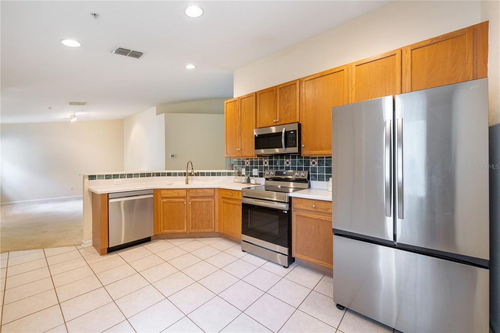 Photo of 2679 Metro Sevilla Drive #104, Orlando, FL 32835 (MLS # O6355222)