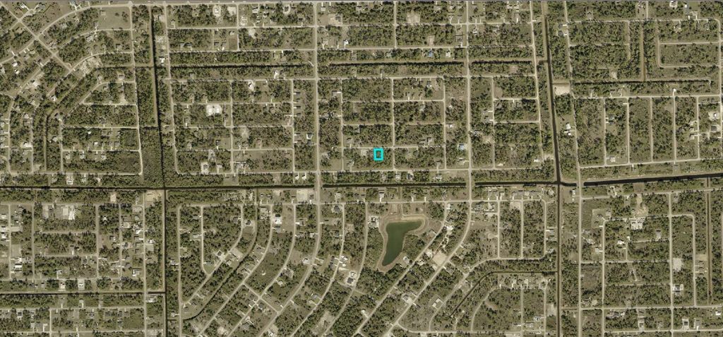 Photo of 1024 Carroll Street E, Lehigh Acres, FL 33974 (MLS # A4681199)