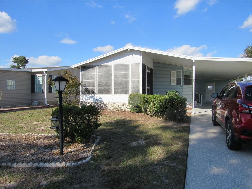 Photo of 514 Nesbitt Park Avenue, Davenport, FL 33897 (MLS # S5140617)