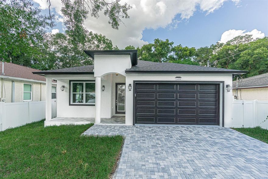 PRICE REDUCTION! BEAUTIFUL BRAND-NEW HOME NETTLED IN THE HEART OF TAMPA WITH THREE BEDROOMS, TWO BATHROOMS, TWO CAR GARAGE AND SPACIOUS LAUNDRY ROOM. EXTERIOR BLOCK WALLS, SHINGLE ROOF, FRENCH DOORS, IMPACT EXTERIOR DOORS AND WINDOWS, PAVED DRIVEWAY, FULLY FENCED. INTERIOR FEATURES: CEILING FANS, TRAY CEILINGS
APPLIANCES: DISH WASHER, STOVE, REFRIGERATOR, MICROWAVE, DISPOSAL, ELECTRIC WATER HEATER. EPOXY GARAGE FLOORS, PORCELAIN FLOORS ON BATHROOMS AND LAUNDRY, LUXURY VINYL FLOORS THROUGHOUT THE HOUSE. QUARTZ COUNTERTOPS ON BATHROOMS AND LAUNDRY, GRANITE KITCHEN COUNTERTOPS. THIS HOME IS CLOSE TO EVERYTHING, JUST 10 MIN DRIVE TO DOWNTOWN TAMPA, RESTAURANTS, SHOPPING MALL, TAMPA INTERNATIONAL AIRPORT, FAMOUS THEME PARKS "BUSH GARDENS", “TAMPA ZOO” AND "ADVENTURE ISLAND", ARMATURE WORKS, STRATZ CENTER, RAYMOND JAMES STADIUM AND MUCH MORE. NO HOA