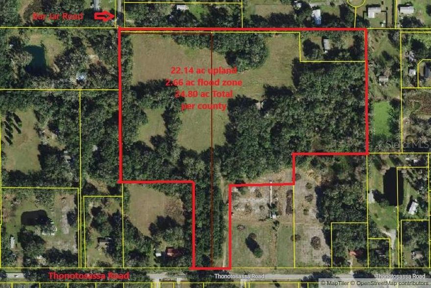 Rare opportunity to acquire approximately 26± acres of agricultural land located just north of Plant City, Florida. This expansive property includes three individual folios and offers approximately 22± acres of upland, as identified by county records. With frontage and access from Thonotosassa Road and an easement off Bar Jar Road, the layout provides flexibility for various uses.The property features two residences: a three-bedroom, two-bath concrete block home and a three-bedroom, two-bath double-wide manufactured home. Each home is equipped with its own well and septic system. Additionally, the main portion of the property is serviced by an 8-inch commercial well, offering excellent water supply for agricultural or potential commercial use. The land has historically supported farming operations including row crops, and is currently being used for hay production. A natural creek runs along the southern boundary, enhancing the natural beauty and functionality of the site.Zoned Agricultural, the property allows for a variety of permitted uses including farming, equestrian activities, and agricultural animal housing. Additional conditional uses may include churches, single-family residential development, event venues, and more—subject to county approval. Buyers are advised to verify all intended uses directly with Hillsborough County.Conveniently located between Thonotosassa Road and Bar Jar Road, and just minutes from Interstate 4, this property presents a unique investment opportunity in a growing area with rural charm and future development potential. Includes folio numbers 081347-0050, 081347-0100, 081347-0025. Tax information is for folio 081347-0050