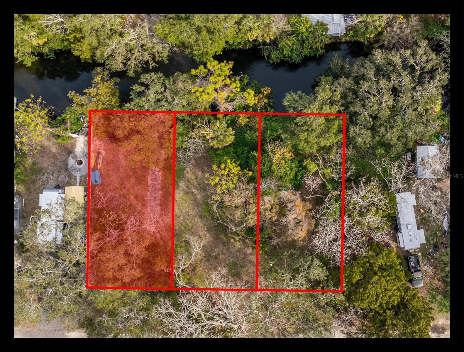 Affordable Waterfront Living. Lot with private boat ramp ready for your new home! Direct Gulf Access by boat, jet ski or kayak. Located in the Gulf Side Villa subdivision. No HOA, No deed restrictions. Single family homes, mobile homes welcome! Water, sewer, electric and high-speed internet available. 45ft of waterfront. Spring fed freshwater canal, just a 10 minute boat ride to the Gulf. Many local waterside dining options nearby. Short distance to US 19 for easy commuting, shopping and major hospitals. 2 adjacent lots also available for purchase. (Lot lines on photos are not exact measurements)
