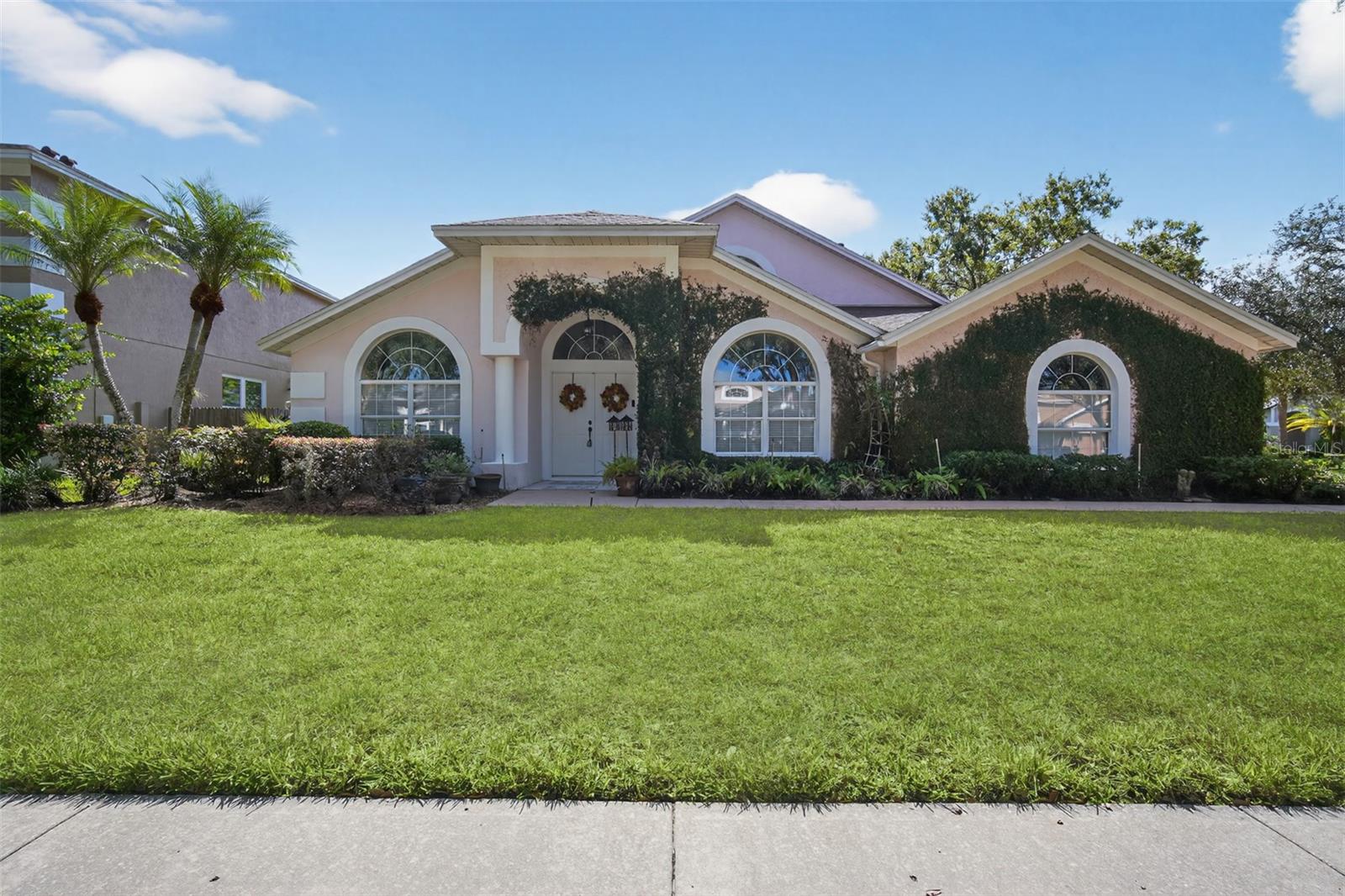 Charming 4-Bedroom Home in the Heart of Tampa PalmsWelcome to 16005 Ridley Place, a spacious and light-filled 4-bedroom, 3-bath home nestled on a generous corner lot in a peaceful cul-de-sac within the desirable Manchester subdivision of Tampa Palms.Step inside to discover an open floor plan with soaring cathedral ceilings and abundant natural light, creating a warm and welcoming atmosphere perfect for everyday living and entertaining. The living room and formal dining area sit gracefully at the front of the home, while the kitchen—featuring a large island, dining nook, and updated appliances—opens to a comfortable family room and a screened patio that offers flexible indoor-outdoor living space.The expansive primary suite is a true retreat, complete with a cozy sitting area, two walk-in closets, and a bright en suite bathroom featuring dual sinks, a soaking tub, twin-head walk-in shower, and private water closet. Three additional bedrooms are located on the opposite side of the home, including one currently used as a home office with its own full bath—ideal for guests or remote work.Recent updates include:    •    New roof (2017)    •    New garage door opener (2022)    •    New gas water heater (2025)All updated kitchen appliances, washer and dryer stay. Energy-efficient contractor upgrades such as double-pane windows, sliding doors, fixed glass, foam injected into all exterior walls,attic radiant barrier with additional attic insulation create an energy efficient home and year-round comfort.Outside, you’ll find a beautifully landscaped yard offering plenty of space to relax, garden, or play. The home is conveniently located near top-rated schools, Tampa Palms Golf & Country Club, shopping, dining, parks, and more.This home’s strong foundation, spacious layout, and prime location make it an excellent opportunity for anyone looking to create their dream home.Investors and cash buyers are welcome. Sold “As-Is” and priced to sell—don’t miss your chance to own this gem in one of Tampa’s most sought-after communities! -Florida Realtor’s “As-Is” contracts only please.