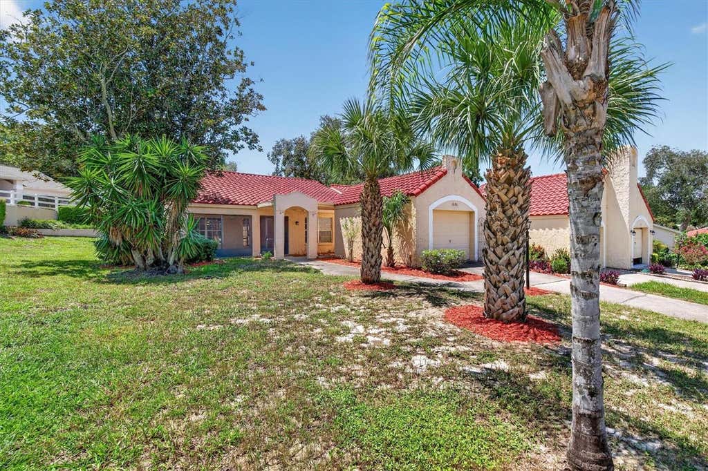 Photo of 1650 Highland Club Lane, Palm Harbor, FL 34684 (MLS # TB8540850)