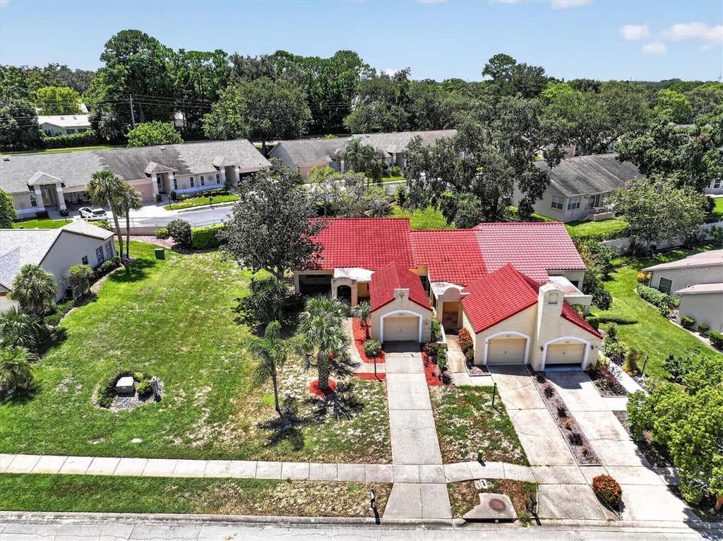 Photo of 1650 Highland Club Lane, Palm Harbor, FL 34684 (MLS # TB8540850)