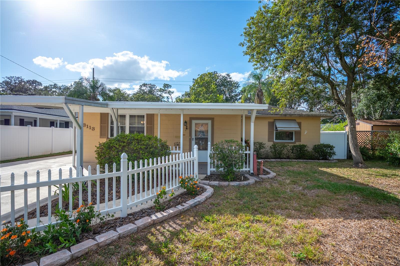 Welcome to Your Lakeland Oasis! This inviting 2-bedroom, 1-bathroom home in Lakeland, FL, offers a comfortable and peaceful lifestyle. The property boasts a spacious two-car carport, providing shelter for your vehicles. Enjoy your morning coffee on the front porch or unwind on the rear porch, both perfect for relaxing and taking in the Florida sunshine. With a convenient storage shed and a fenced yard, you have ample space for storage and outdoor activities. Whether it's gardening, barbecues, or simply enjoying the outdoors, this home offers the perfect backdrop. Nestled in a desirable Lakeland neighborhood, you'll have easy access to schools, parks, shopping, and all the amenities you need. This property is the ideal retreat, offering comfort and convenience in a serene environment. Don't miss out on the opportunity to make this Lakeland gem your very own. Schedule a viewing today and discover the joys of calling this place home!