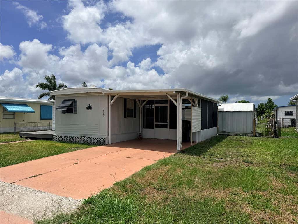 Photo of 208 50th Avenue Drive E, Bradenton, FL 34203 (MLS # A4697441)