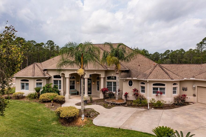 Sought after equestrian paradise in the private gated community of Eagle Rock Ranch. As you pull into the property, you are met with a newly paved driveway and an alarm that will alert you with incoming visitors and package deliveries. A beautiful live pond full of fish and covered with lily pads, welcomes you to this luscious 5-acre property. Newly seeded grounds. This property features 3 spacious bedrooms with large walk-in closets, an additional den/office with possibility of being a 4th bedroom, 3 full bathrooms, 1 half bathroom, triple trey cathedral ceilings, and a gas fireplace. The kitchen is perfect for entertaining with double ovens, sizable bar seating, custom made cabinetry with pull out drawers, and a brand-new stove top will surely impress your guests. This kitchen features a trash compactor, under cabinet lighting, built-in microwave, and a walk-in pantry that is connected to a large laundry/office flex space that leads to a 3-car garage. This roomy 3 car garage has ample room to house your vehicles and toys. Enjoy music throughout the entire house, garage, and patio with a state-of-the-art Sonos system. Take an evening swim in the solar heated pool while enjoying the sunset over the second pond to the rear of the property.  When you grab your morning eggs from the chicken coop, miniature horses, cows, and geese will be there to greet you. There are too many features to mention, you must see for yourself. Upgrades include but not limited to: accent and niche lighting throughout, screened enclosure around the pool is only a year old, pull down sun shades in the covered pool lanai area, the home saltwater system is only 1-2 years old, plantation shutters 2020, shed 2020, pavement was completed in March 2020, both ponds have fish, over 5 acres with 25ft buffer around the property for privacy from neighbors, electric is run down the driveway for future automatic gates....Please see attached document for more upgrades.