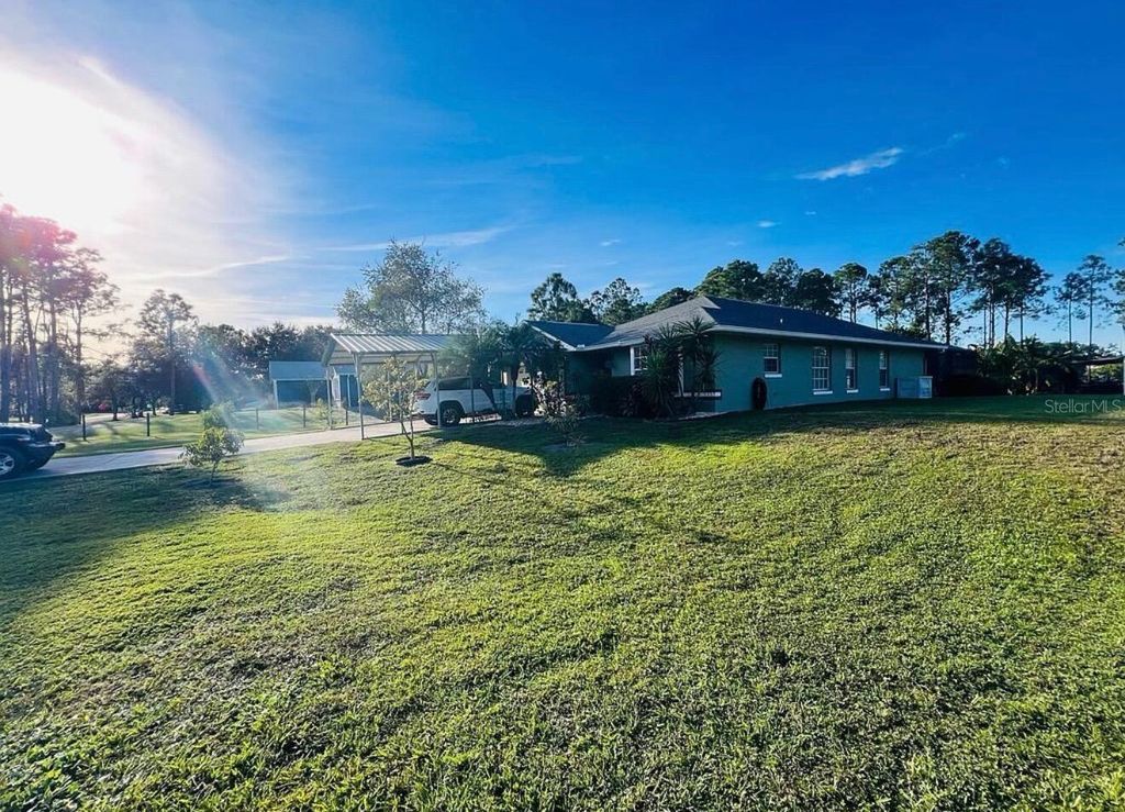 Photo of 6975 Maverick Trail, Saint Cloud, FL 34771 (MLS # O6380731)