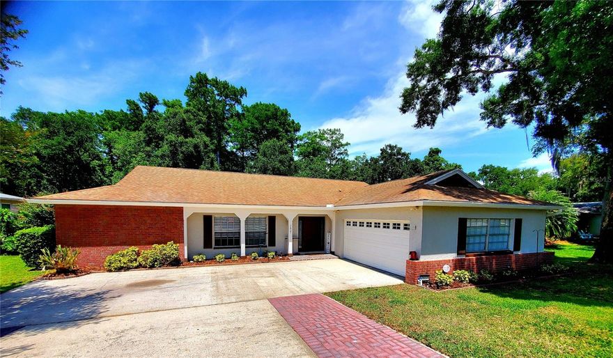 ** REMODELED HOME ON PRESERVE! ** Looking for a fully updated home on a large lot with a stunning view? Your search ends here! Beautifully renovated in 2026, this spacious living room features a custom built-in with flat-screen TV, surround sound, and electric fireplace. New recessed lighting runs throughout, along with fresh texture, paint, and stylish wood vinyl flooring. The open floor plan is perfect for entertaining, with an updated kitchen boasting a brand-new island bar for casual dining and a large space for formal dining or a den. Enjoy the backyard view from the sunroom and its wall of windows. The split-bedroom layout includes two suites: the master with a walk-in closet and a renovated bath featuring a striking walk-in glass shower and matching garden tub, and a second suite for guests or in-laws with another modern bath. Large 72" lighted ceiling fans complement every bedroom and the living spaces. The third hall bath offers resort-style features. Step outside to an elevated brick patio deck ideal for outdoor gatherings, overlooking a scenic view. The large, newly fenced yard is perfect for pets and play, with the lot stretching nearly an acre into the woods. A new air-conditioned shed adds convenience. At night, showcase your home with newly installed Dow lights in the soffit. Major updates include A/C (2024), water heater (2023), roof (2014), and windows/doors (2013).