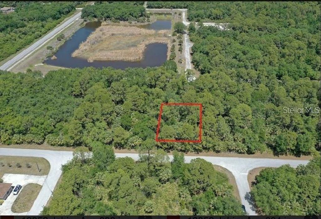 Photo of 18052 Jabiru Avenue, Port Charlotte, FL 33948 (MLS # O6223193)