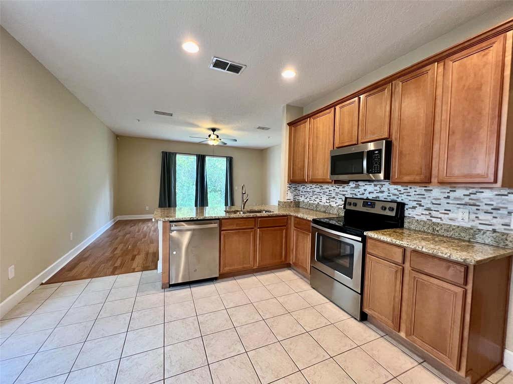 Photo of 10429 Kristen Park Drive, Orlando, FL 32832 (MLS # O6429337)