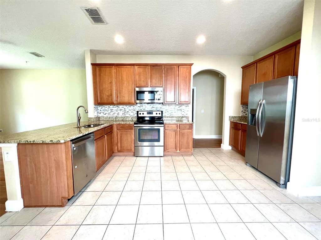 Photo of 10429 Kristen Park Drive, Orlando, FL 32832 (MLS # O6429337)