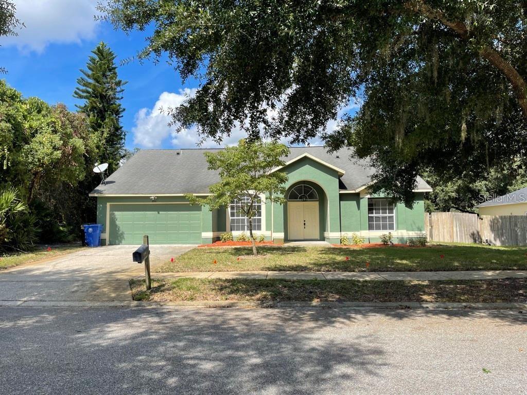 REMODELLED Kitchen and bathrooms, FULLY FENCED-IN YARD with 3 bedrooms + BONUS ROOM/POTENTIAL 4TH BEDROOM/HOME OFFICE, and 2 bathrooms home zoned for OVIEDO TOP-RATED SCHOOLS! Freshly painted on the inside, this light and bright, SPACIOUS home WITH OPEN FLOOR & SPLIT PLAN is ready for you to call Home Sweet Home. Located 0.5 miles from Stenstrom Elementary (with no road crossings), just 1 mile from CENTER LAKE PARK which offers numerous restaurants, entertainment, a splash pad, and playground facilities, and 1.1 miles from the nearest grocery store - the community is literally at your fingertips! ALL TILE - NO CARPET! FRESH NEW BAHIA SOD THROUGHOUT THE WHOLE BACKYARD. The formal Living and Dining rooms converge into an OPEN FLOOR PLAN, BRAND NEW WHITE KITCHEN QUARTZ COUNTERTOPS & BREAKFAST BAR that overlook the kitchen nook and backyard. The north-south orientation of the home conveys rays of sunlight through the windows all day long. 890 CALAFUT COURT SITS IN A NICE, QUIET & ESTABLISHED SEMINOLE COUNTY COMMUNITY WITH NO DRIVE-THRU TRAFFIC. Call Today for an appointment.