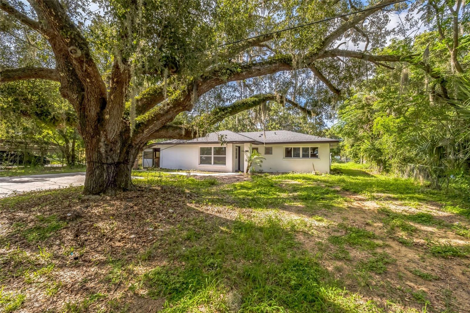 This beautifully renovated home offers comfortable living with modern updates and timeless charm. Featuring a spacious layout, it’s perfect for relaxing or entertaining. The screened rear porch provides a peaceful spot to enjoy the outdoors year-round. Inside, you'll find fresh finishes and an inviting atmosphere throughout. A brand-new roof offers peace of mind and long-term value. The home is situated on a generous lot with room to garden, play, or simply unwind. Natural light fills the interior, enhancing the warm and welcoming feel. There's no HOA, giving you the freedom to make it your own. The open living spaces flow effortlessly, making everyday life a breeze. Whether you're a first-time buyer or looking to downsize, this property fits the bill. Quiet location yet convenient to shopping, dining, and local amenities. Solid construction and thoughtful updates make this a smart investment. The kitchen and bathrooms feature tasteful improvements. Neutral colors make it easy to move right in. Come see how this home checks all the boxes!