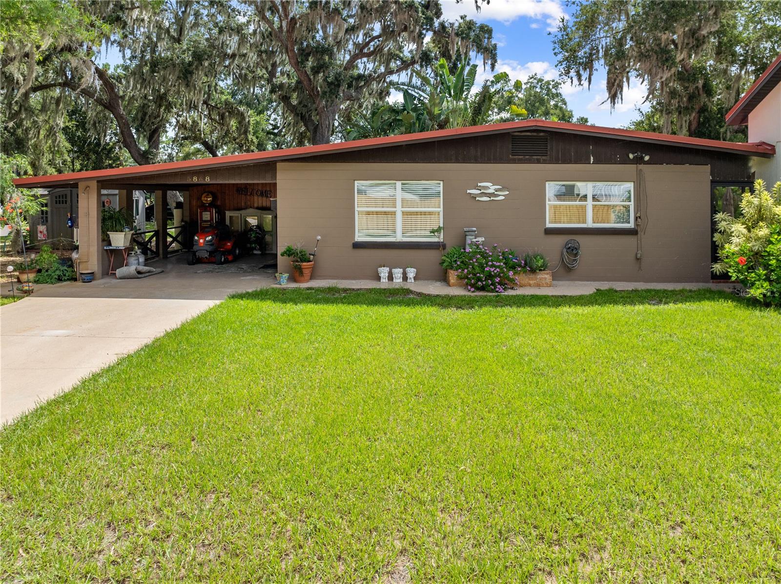 Heated/Total sq ft includes both homes on property. Fabulous Alligator Lake Property with TWO homes. The 1st property was built in 1960 and has a 2 bedroom 2 bath 1125 sq. ft. home with ceramic tile throughout, crown molding, a screened porch, and a carport with laundry facility and full bath. The home has a metal roof . The utilities are septic and well, water softener. Exterior features include a gazebo, carport, outdoor shower, and laundry hook up. The second single family home was built in 2023 on this .84 acre parcel. The second home has 1 bedroom and1.1 baths, Great room, full kitchen and dinette, a 365 sq ft garage and 12 x 13 screened porch. The bedroom has a 13 x 5 walk in closet, the full bath has a walk in shower with bench and shampoo niche. Other features include 9 foot ceiling, 8 foot doors, linen closet in the 1/2 bath, storage closet in the laundry room, and a walk in storage closet in the hall. Water is available at the rear of the home and also down by the lake in the gazebo. The Alligator Chain of Lakes is an 8,352-acre, 12-lake chain of lakes system. Out of the 12 lake system, 6 of the lakes are connected by navigable waterways, and 6 lakes in the chain require a re-launch. The Alligator Chain’s lake farthest north is Lake Center and Brick Lake is the southern most lake on the Alligator Chain.