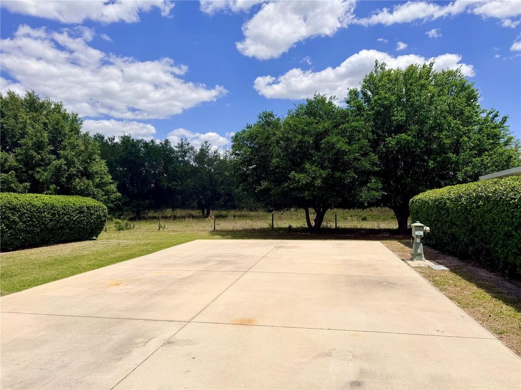 Photo of 9589 SE 49th Terrace, Webster, FL 33597 (MLS # G5111450)