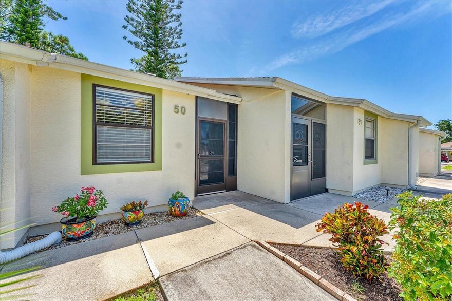 Welcome to peaceful Wildflower Village! This beautifully maintained condo radiates pride of ownership with its neat, clean, and comfortable feel. The well-appointed layout offers both functionality and charm, making it an inviting space to call home. A few added features include a pull down attic access and rerouted plumbing piping above ceiling. This unit also provides a shed and a carport for extra added convienience. Nestled in a quiet community yet conveniently close to Gulf beaches, premier fishing spots, world-class golf courses, shopping, dining, and  entertainment, this property blends relaxation with everyday convenience. Whether you’re seeking a full-time residence, a vacation retreat, or a smart investment, this gem checks all the boxes. Welcome to Paradise!