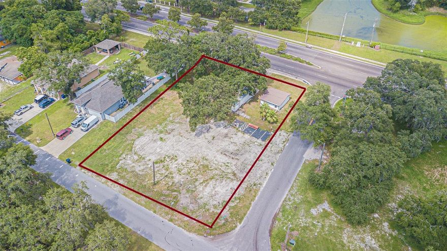 This exceptional double-lot property has been home to a well-established, family-owned and operated seafood fish market for over fifty years. Nestled on more than half an acre, it boasts coveted General Commercial (CG) zoning and a prime location at the northwest corner of 40th Street, Pine Tree Place, and Lakeshore Drive. With frontage on three roadways and curb cuts on N. 40th Street, E. Pine Tree Place, and Lakeshore Drive, this highly visible and accessible site offers unparalleled potential. Featuring ample space, including picnic seating, this property presents a unique opportunity for investors or entrepreneurs seeking a landmark location with a rich history or even to be converted into rezoning for residential or multi-family purposes. **The owner is open to SELLER FINANCING with $250,000 down.**