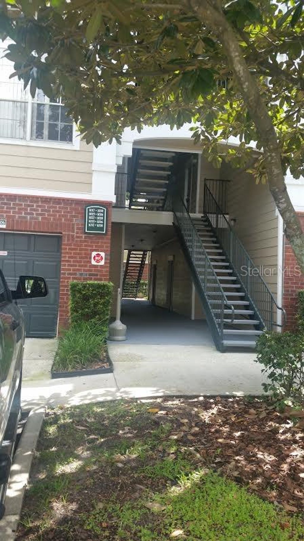 Photo of 13015 Plantation Park Circle #1017, Orlando, FL 32821 (MLS # O6397456)