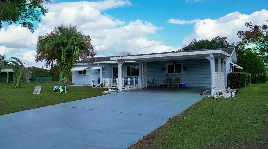 Step inside this beautifully maintained 3-bedroom, 2-bath residence nestled on the quiet end of a desirable 55+ community. Thoughtfully laid out, this home offers comfortable living with an inviting Florida room perfect for morning coffee, relaxing afternoons, or entertaining guests. The light and bright interior features spacious living areas, well proportioned bedrooms, and the convenience of indoor laundry. Ample storage is a standout, with two dedicated workshop/ storage units providing plenty of room for hobbies, tools, or seasonal items. Enjoy peaceful surroundings, friendly neighbors, and the easy Florida lifestyle in a well kept community close to shopping, dining, and everyday essentials. This move in ready home is ideal for those seeking comfort, convenience, and tranquility all in one place. Book your showings today!