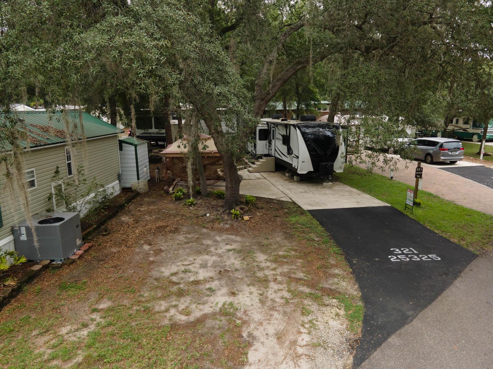 Premium RV Lot for Sale in Elite Salt Springs Resort, Salt Springs, FL
Located in the heart of Florida's natural beauty, this 3,500 sqft RV lot in the prestigious Salt Springs Resort offers an unbeatable opportunity to experience the charm of the Ocala National Forest and the tranquil waters of Little Lake Kerr.
Property Features:
Size: Spacious 3,500 sqft lot, ready for your RV.
Resort Amenities:
Clubhouse for community gatherings.
Two refreshing swimming pools and a hot tub.
Tennis courts, shuffleboard, and basketball courts.
Playground and dog park for family-friendly fun.
Private dock and boat ramp for direct access to Little Lake Kerr.
Active social calendar with year-round planned activities.
Utilities & Infrastructure:
Secure, gated community with 24/7 access.
All necessary hookups for your RV.
Storage shed included.
Location Benefits:
Walking distance to local restaurants, laundromat, post office, shopping, and the springs.
Just minutes from the stunning Salt Springs Recreation Area and crystal-clear natural mineral waters.
Nestled between the historic St. Johns and Ocklawaha Rivers, perfect for boating, fishing, and outdoor adventures.
Located 35 miles east of Ocala, surrounded by the pristine Ocala National Forest.
Ideal for:
Nature enthusiasts, water sports lovers, and fishing aficionados.
Weekend adventurers or those looking for a peaceful full-time residence.
Families looking to make lasting memories in a serene and welcoming community.
Community & Lifestyle:
Salt Springs is a quaint and friendly community offering both relaxation and adventure. Whether you're enjoying a peaceful afternoon at the clubhouse or exploring the forest's hiking trails, this lot provides access to endless outdoor activities. The HOA fee of $638 per quarter includes maintenance of resort amenities, keeping everything in top shape year-round.
Your Slice of Paradise Awaits:
Secure this rare opportunity to own a premium RV lot in Salt Springs Resort, and immerse yourself in the beauty and adventure of natural Florida. With everything you need for comfort and enjoyment, this lot is ready for you to make it your own.