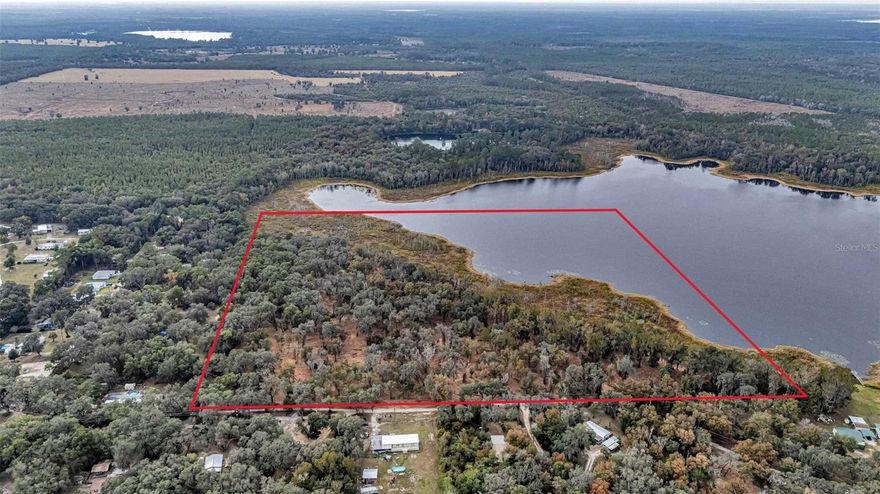 Property fronts Moss Oak Lake which leads, via canals, to 576 acre Little Orange Lake.   This property provides an opportunity for fishing, enjoying a heavily wooded lot, but is  less than 30 minutes to Gainesville and 45 minutes to the St. Johns River.  The property is approximately 
17 acres of uplands, with elevations up to 108 feet (20 feet above Moss Lee Lake), and 23 acres of Moss Lee Lake.   The property has road access along Faye Street and the property can be viewed from Faye St.