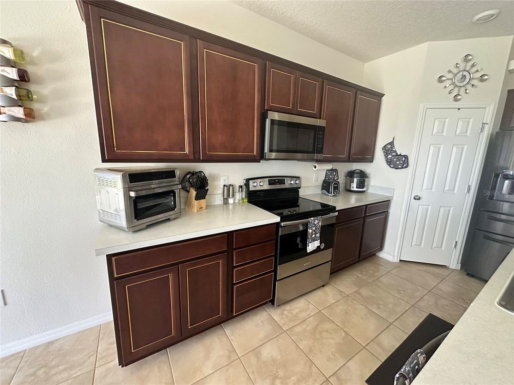 Photo of 446 Citrus Isle Loop, Davenport, FL 33837 (MLS # S5134836)