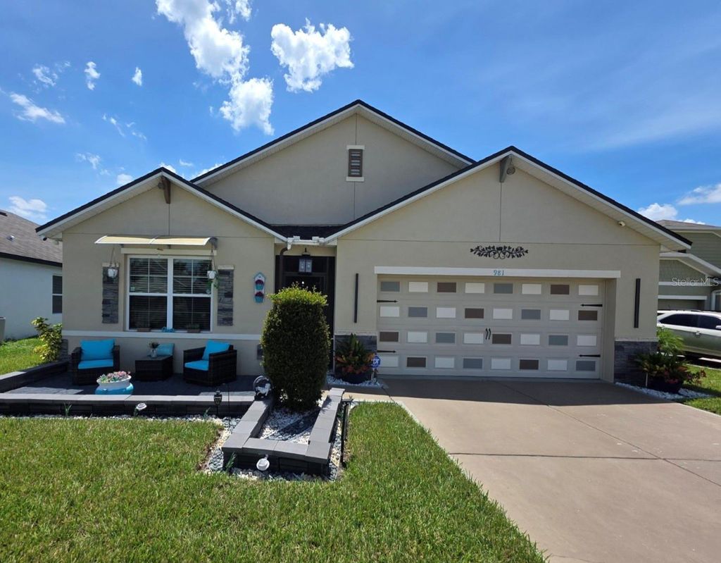 Photo of 981 Chanler Drive, Haines City, FL 33844 (MLS # S5138163)