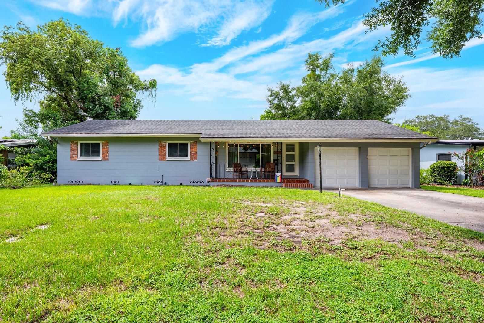 Seller may consider buyer concessions if made in an offer ***Move right in to this single story 3BD/2BA + BONUS block home in the highly desired Dover Shores community of 32806! Set on a generous .22 ACRE LOT, this home combines modern UPDATES with original CHARACTER in one of Orlando’s most convenient locations. The interior delivers light-filled living and dining areas that feature large picture windows, ORIGINAL HARDWOOD FLOORS, and wiring for surround sound speakers. The UPDATED KITCHEN offers the home chef must have STAINLESS STEEL APPLIANCES, granite countertops, timeless cabinetry, a decorative backsplash, and a breakfast bar that opens to the dining room. A pocket door leads to the BONUS ROOM, perfect for a home office or additional casual living, with direct access to the screened lanai. Your PRIMARY SUITE includes a WALK-IN CLOSET and an UPDATED PRIVATE BATH, while bedrooms two and three share a guest bath with a new vanity boasting dual sinks, a sleek countertop, decorative mirror and stylish lighting. Key improvements include updated windows - 2018, A/C - 2018, electrical panel - 2017, and a ***BRAND NEW ROOF WILL BE INSTALLED PRIOR TO CLOSING. Outdoor living is a highlight here with a large SCREENED LANAI that opens to a PAVER PATIO complete with a FIRE PIT and HOT TUB. You will also appreciate the fully FENCED YARD with plenty of mature trees that create a park like setting. Dover Shores offers a prime central location just off Curry Ford Rd with easy access to SR 408 and I-4. You are just minutes from Downtown Orlando, the vibrant Mills and Hourglass Districts, shopping, dining, parks, lakes and so much more. A great starter home or investment property (NO HOA)! With modern updates, classic character, and a central location, this Dover Shores home is a standout choice for buyers looking for both convenience and value – call today to schedule a tour!