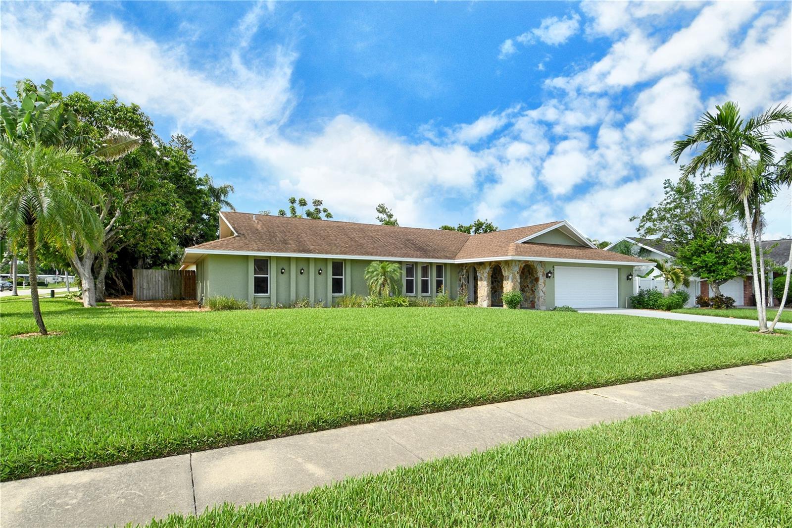Welcome to this unique Northwest Bradenton home, meticulously maintained by its engineer-owner for 25 years. One of the larger homes in the neighborhood, this nearly 2,700 SF corner-lot property puts the focus on public spaces for entertaining and large families, with a big living room (20 x 18) at the front and an enormous 39 x 15 family room overlooking the pool area through wraparound walls of sliding glass doors! At the center of it all is the kitchen designed for easy traffic flow and a mile-long long bar for large-group dining and entertaining. The split-plan bedroom layout offers privacy for everyone, and the owners suite includes its own lounging area for when you’d like a little private time. The small HOA of Belair Bayou costs only $150 a year but provides for street lighting and a safe, serene family environment with no noisy short-term vacation rentals allowed. Working in the large kitchen is a breeze, with a clear view of the entire pool area through the family room -- throw the doors wide open and celebrate when the weather is right. Expect to relax trouble-free thanks to recent exterior paint, new garage door, newer AC & pool equipment, brand new water heater, and not a stitch of carpet. Bring your water toys because this house is situated less than a mile to Warner’s Bayou Boat Ramp, 3.5 miles to Robinson Preserve and DeSoto National Memorial Park, and under 15 minutes to beautiful Gulf Beaches. Residents love NW Bradenton for lots of reasons, including great schools and nearby amenities like shopping, salons, restaurants, medical care, and picturesque downtown Bradenton just minutes away. 6303 3rd Ave NW is a great tranquil getaway to come home to, so come see it and make it yours.
